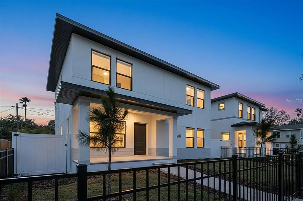 New home construction Tampa FL — modern new build with premium exterior finishes
