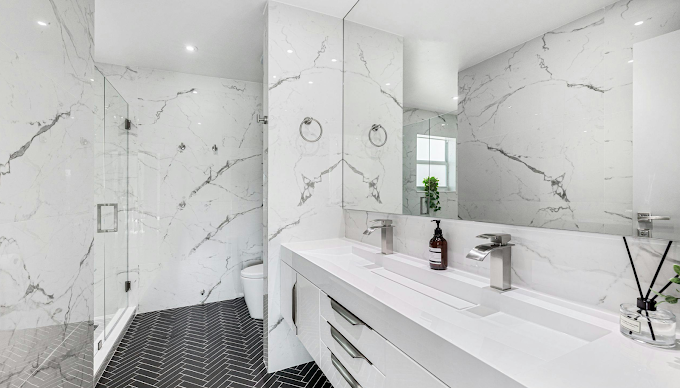 Bathroom renovation Tampa — floating vanity, porcelain tile and modern fixtures