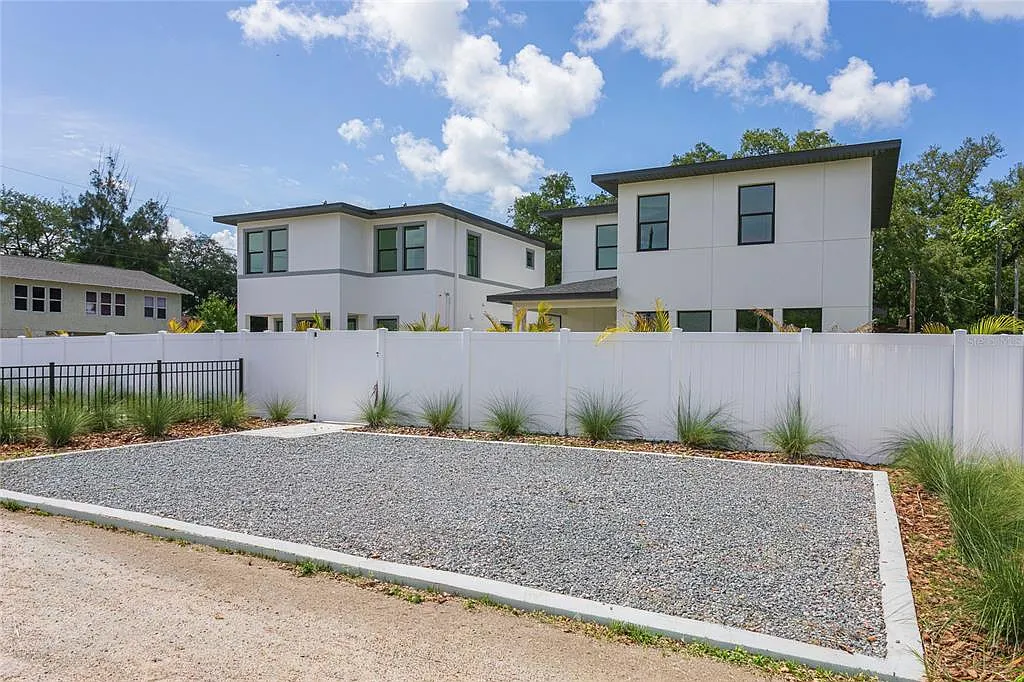 Fence installation Pinellas County FL — wood privacy fence with concrete post footings