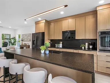 Kitchen remodel St. Petersburg FL — custom cabinetry and quartz countertops