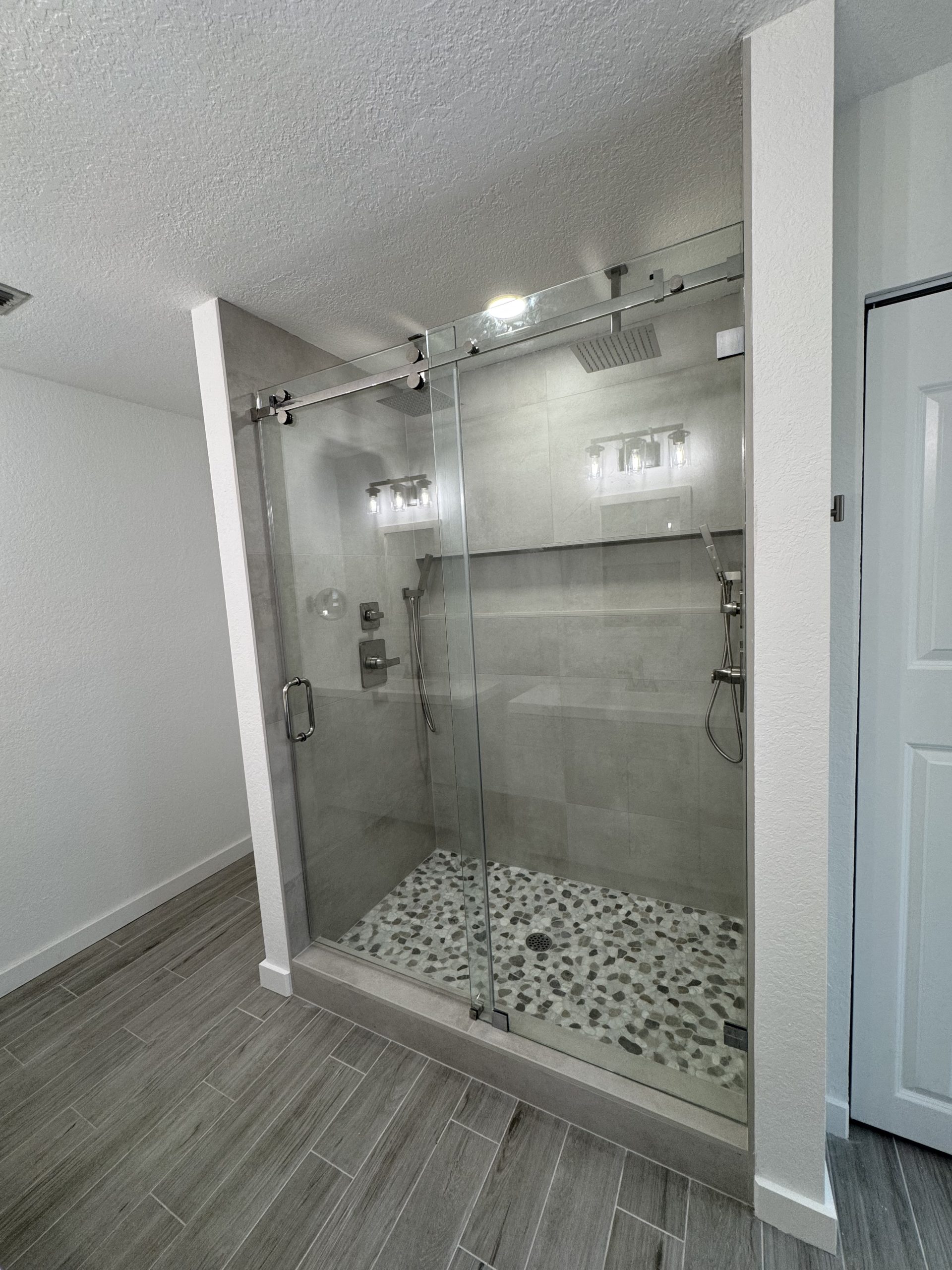 Bathroom renovation Tampa FL — custom tile and modern fixtures