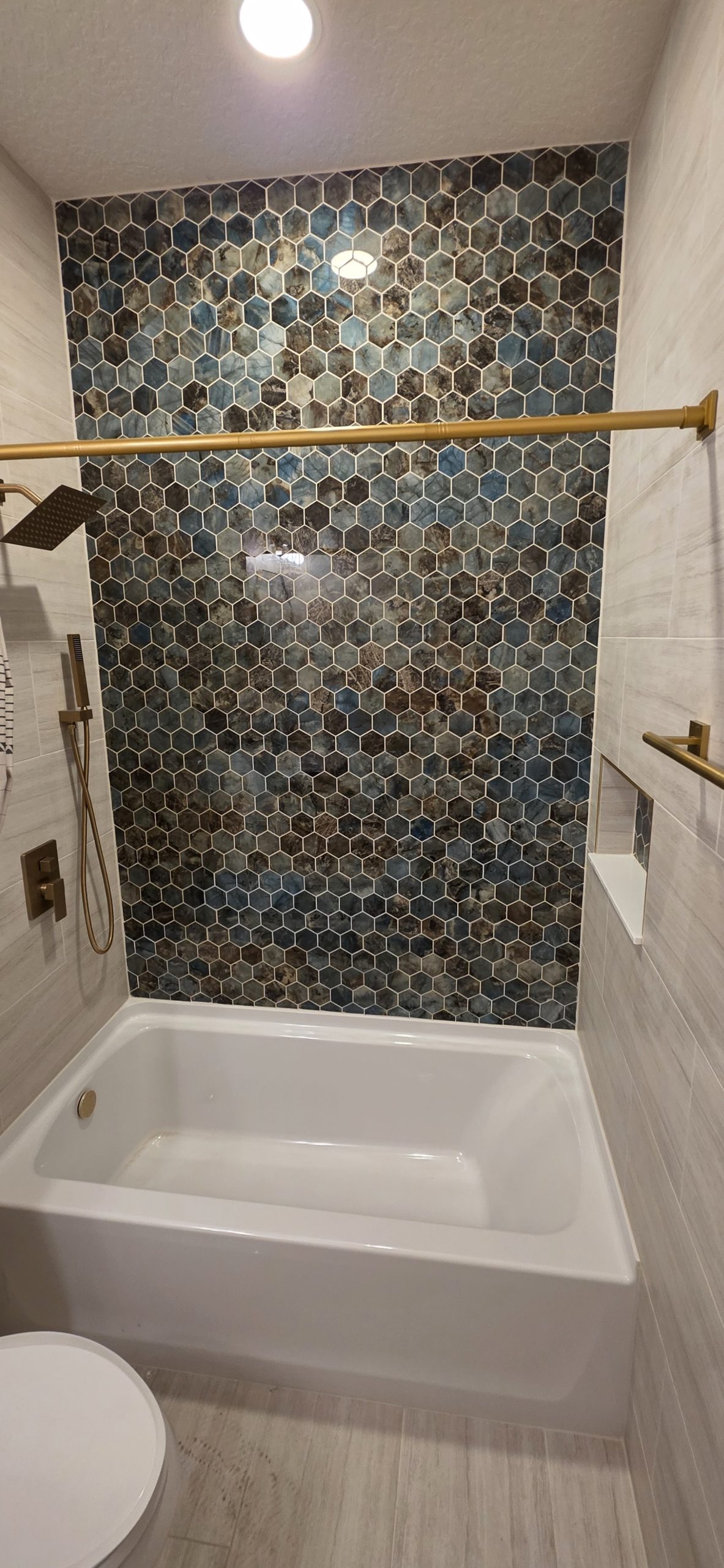 Bathroom remodel Clearwater FL — walk-in shower with premium tile